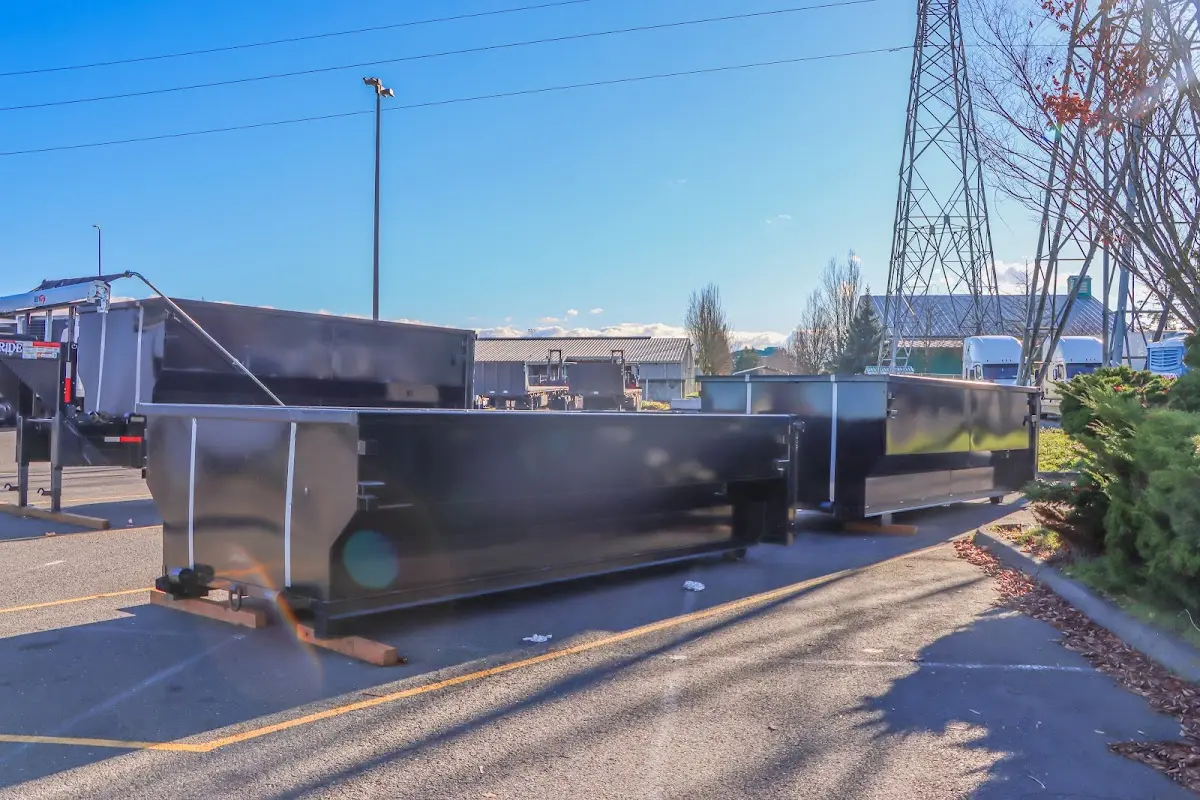 Roll-off dumpster ready for waste disposal at job site for Yard Waste Dumpster Rental in Paris